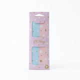 Kids nail files by Oh Flossy with colorful handles, designed for gentle nail grooming for children.