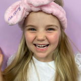 Kids' Oh Flossy cosmetic headband with soft fabric and colorful design, ideal for young children’s hairstyling or accessories.