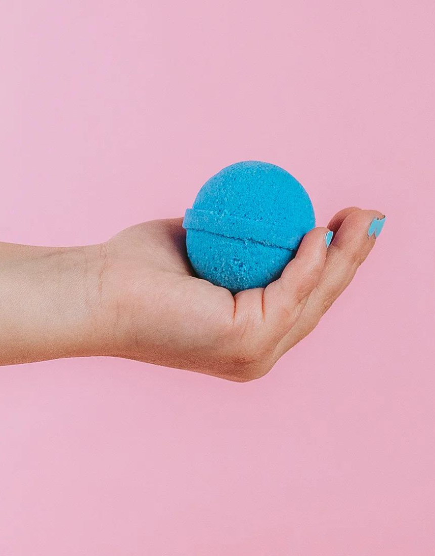Colorful Oh Flossy Kids Mini Bath Bombs set with small round bath bombs in vibrant packaging, designed for children.