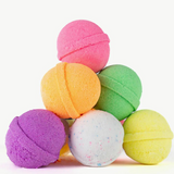 Colorful Oh Flossy Kids Mini Bath Bombs set with small, vibrant bath bombs for children in playful packaging.