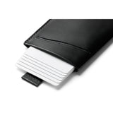 Bellroy Card Sleeve 2nd Edition in black leather holding several credit and ID cards, compact wallet design.