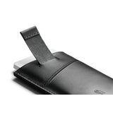 Bellroy Card Sleeve 2nd Edition in black, slim leather wallet with easy-access card slots, shown with multiple cards inserted.