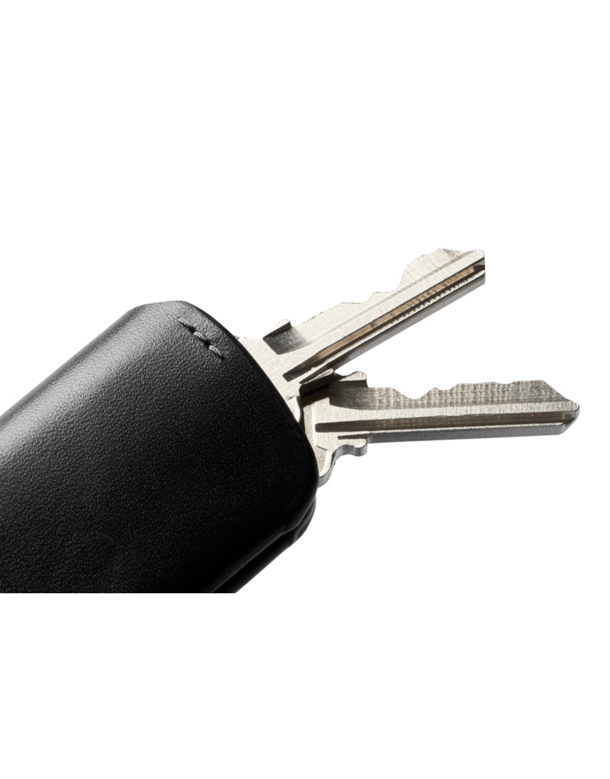Bellroy Key Cover Plus 3rd Edition in black, a sleek leather key organizer with multiple key slots.