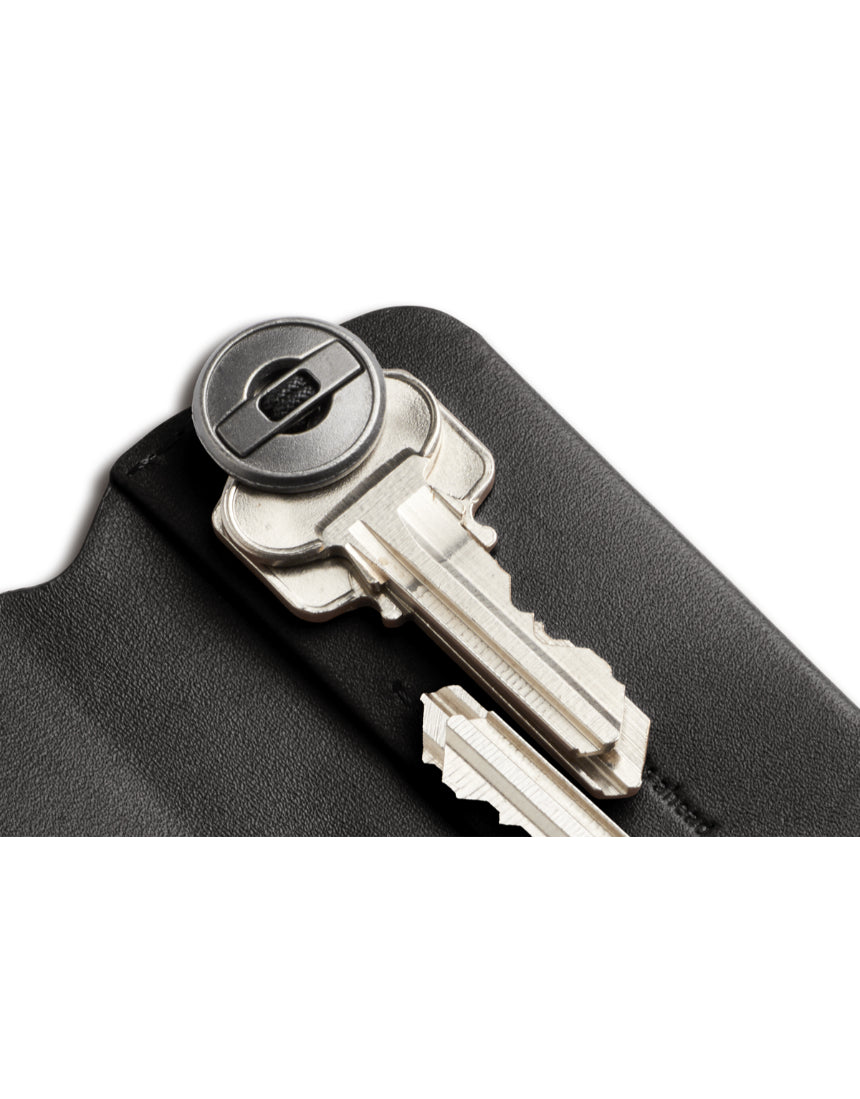 Bellroy Key Cover Plus 3rd Edition in black, compact leather key holder with organized key slots and sleek design.