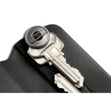 Bellroy Key Cover Plus 3rd Edition in black, compact leather key holder with organized key slots and sleek design.