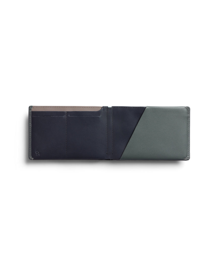 Bellroy Travel Wallet in Everglade leather, featuring multiple card slots and a sleek design for organized travel essentials.