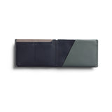 Bellroy Travel Wallet in Everglade leather, featuring multiple card slots and a sleek design for organized travel essentials.