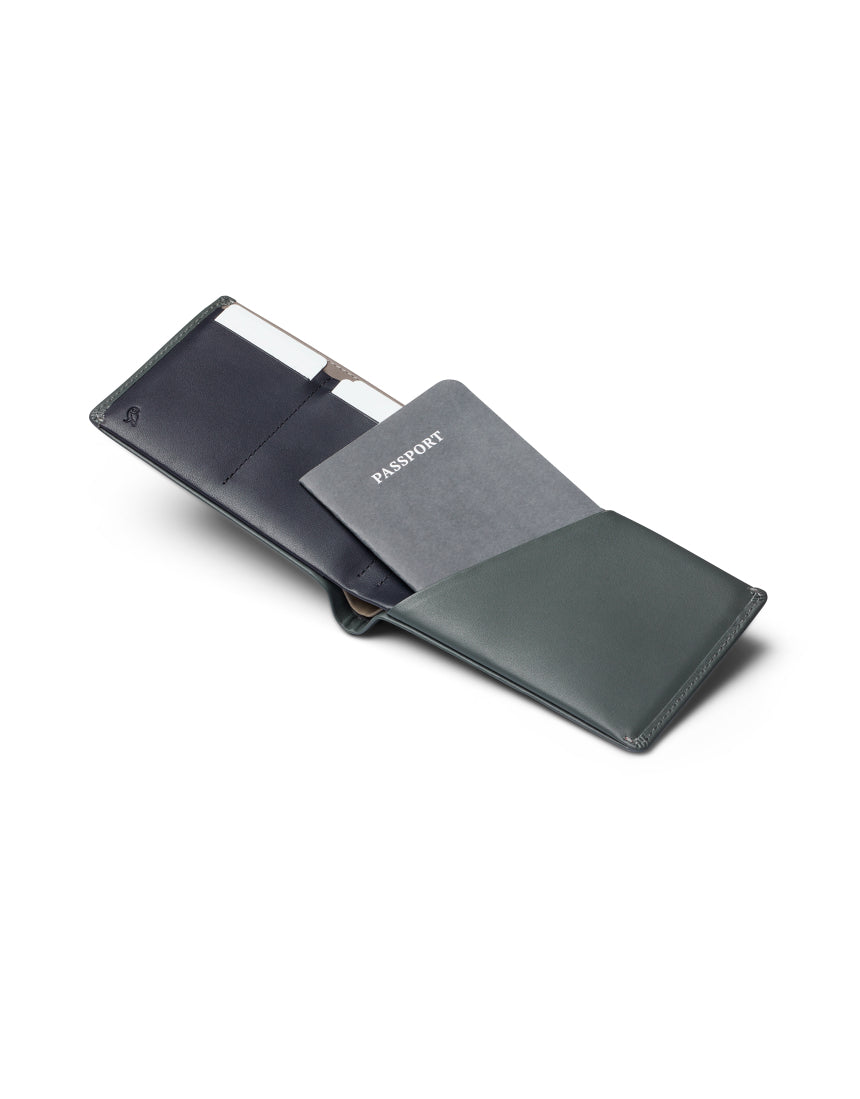 Bellroy Travel Wallet in Everglade leather showing multiple card slots, cash compartment, and sleek design for organized travel.