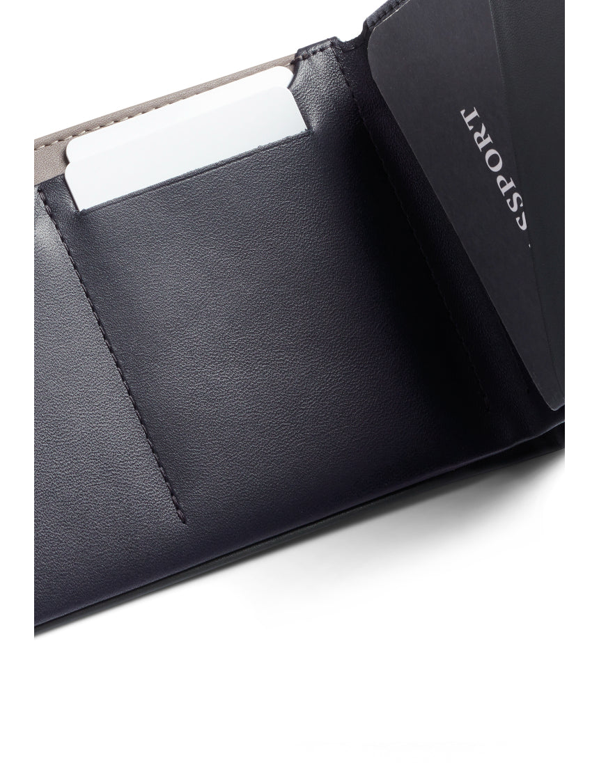 Bellroy Travel Wallet in Everglade leather, featuring multiple card slots and a sleek, compact design for organized travel.