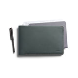 Bellroy Travel Wallet in Everglade leather showing multiple card slots and a bill compartment.