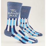 Blue Q The Handyman M-Crew socks featuring a colorful handyman design, made of soft fabric, shown laid flat.