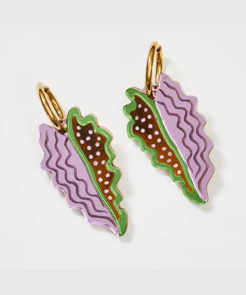Tan and lilac Martha Jean Big Leaf earrings featuring large leaf-shaped design on silver hooks.
