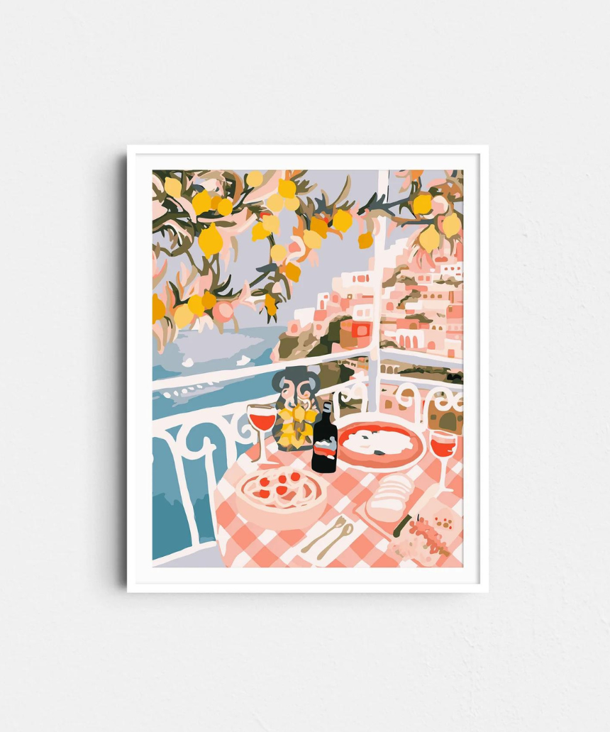 Paint Like Frida Positano rolled paint by numbers kit showing a colorful seaside scene with vibrant flowers and a scenic coast.