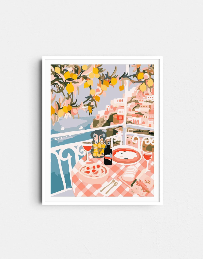 Paint Like Frida Positano rolled paint by numbers kit showing a colorful seaside scene with vibrant flowers and a scenic coast.