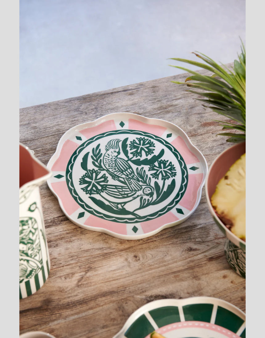 Jones & Co Del Sol bird platter in green, decorative ceramic serving platter with vibrant bird and floral design.