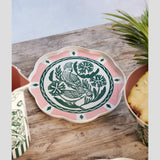 Jones & Co Del Sol bird platter in green, decorative ceramic serving platter with vibrant bird and floral design.