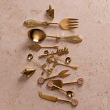 Bonnie and Neil leaves salad servers set with wooden handles and leaf-shaped metal scoops for serving salads and greens.
