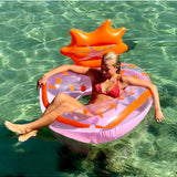 Sunnylife Luxe Pool Ring in strawberry pink, inflatable pool float with a round shape and fruit-inspired design.