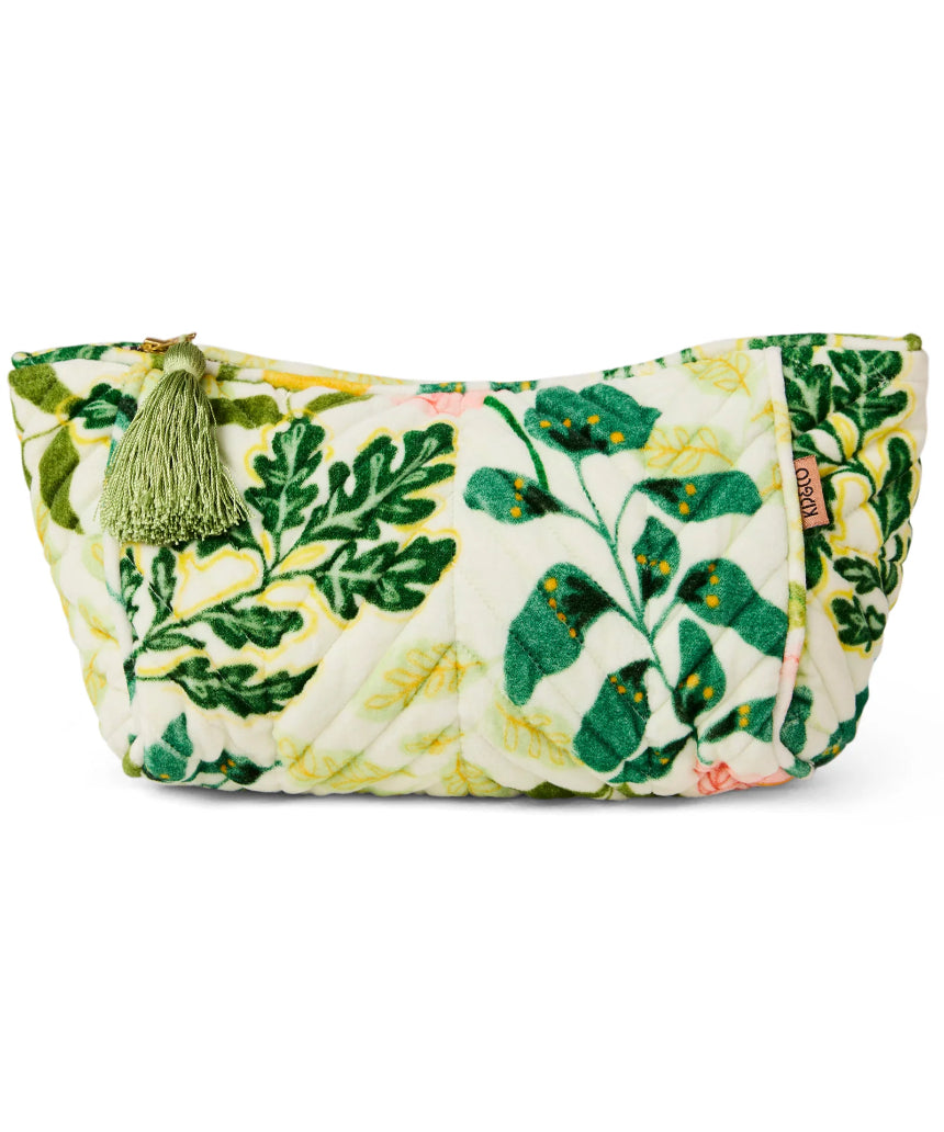 Kip & Co Wander Velvet Toiletry Bag in vibrant colors, soft velvet fabric, zipper closure, and compact design for travel accessories.