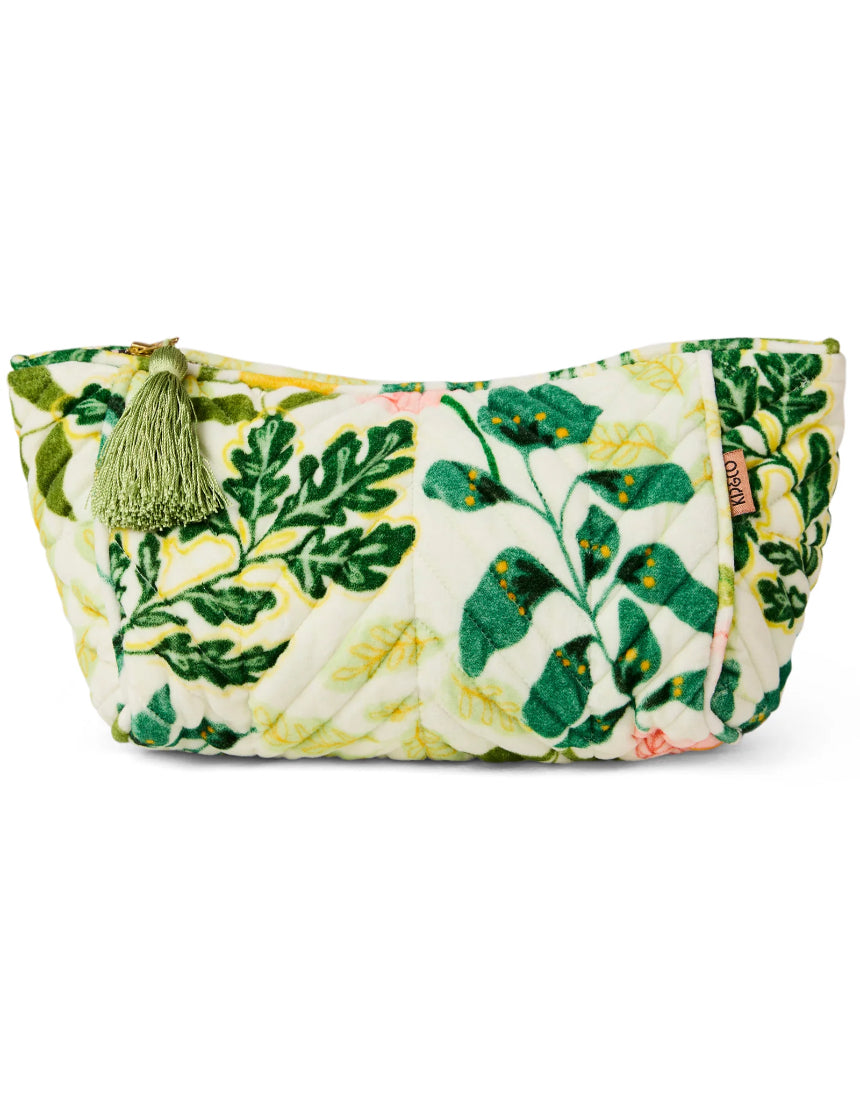 Kip & Co Wander Velvet Toiletry Bag in vibrant colors, soft velvet fabric, zipper closure, and compact design for travel accessories.