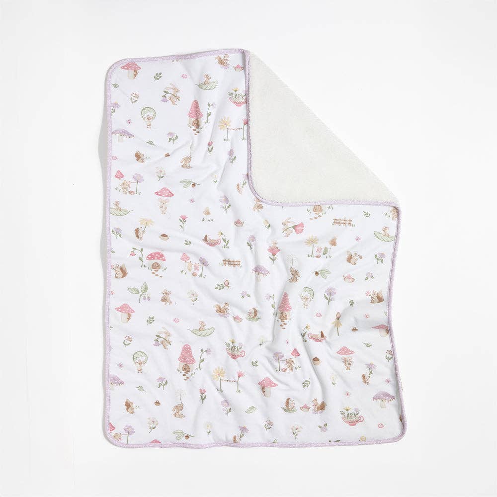 Living Textiles Jersey Sherpa Pram Blanket in Whimsical Wonderland featuring soft, cozy fabric with whimsical patterns for babies.
