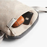 Bellroy City Pouch in Saltbush color, sleek compact bag with zip closure and multiple compartments for everyday organization.