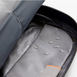 Bellroy toiletry kit in navy with zipper closure, compact design, and multiple compartments for travel hygiene essentials.