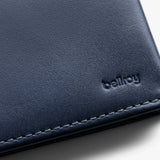 Bellroy Slim Sleeve wallet in navy, showcasing sleek leather design with card slots and minimalist style.