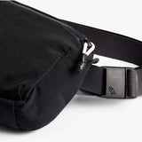 Bellroy Lite Belt Bag in black with adjustable strap and compact design, perfect for carrying essentials on the go.