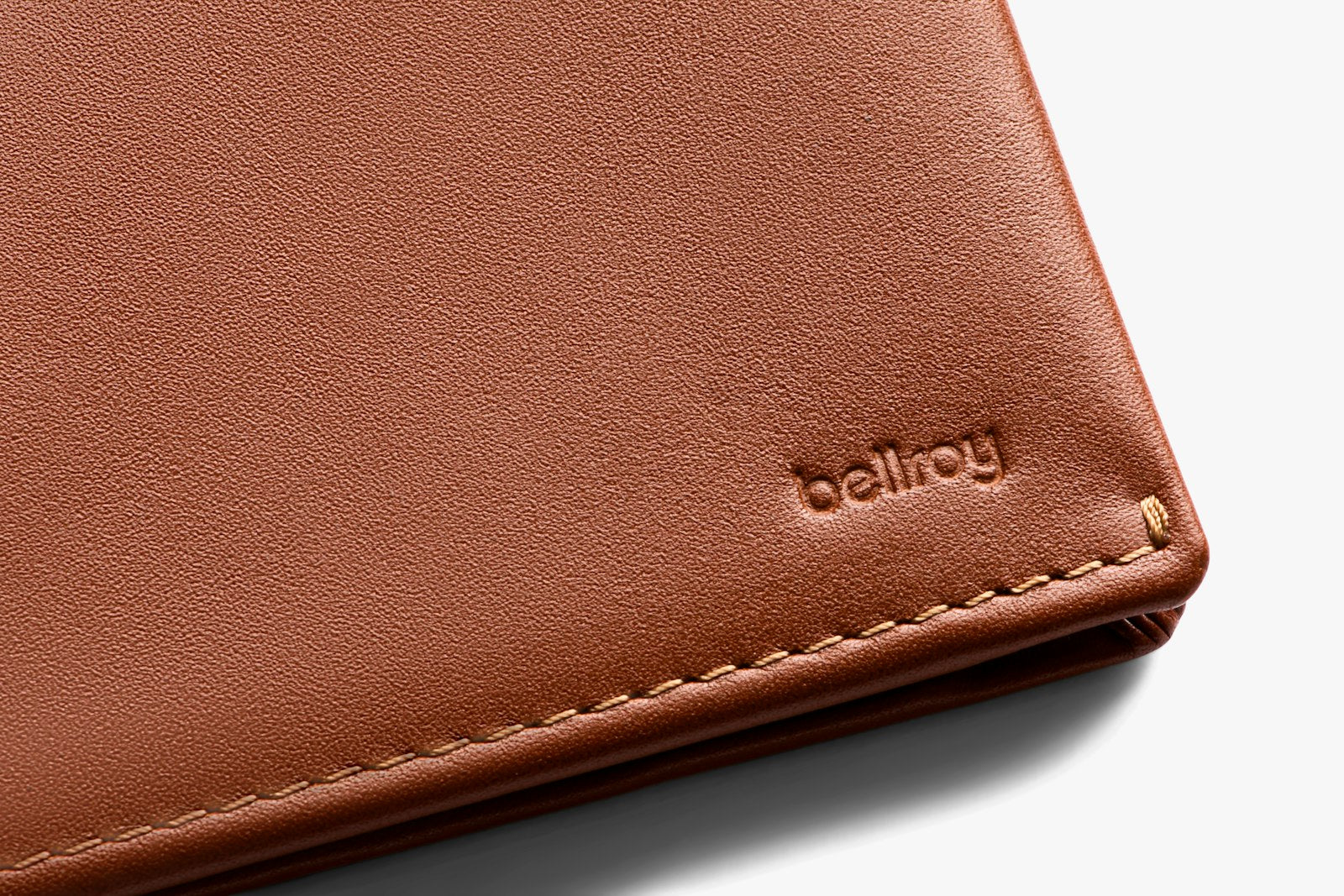 Bellroy Slim Sleeve wallet in sienna leather, featuring compact design with card slots and a sleek, minimalist appearance.
