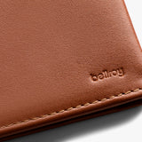 Bellroy Slim Sleeve wallet in sienna leather, featuring compact design with card slots and a sleek, minimalist appearance.