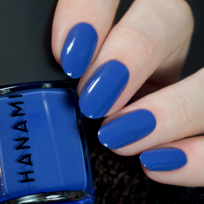 Hanami Cosmetics Hanami Nocture nail polish bottle with dark, glossy finish and elegant label, showcasing a sleek, stylish nail polish product.