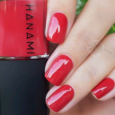 Hanami Cherry Oh Baby nail polish bottle from Hanami Cosmetics with bright cherry red color on the label