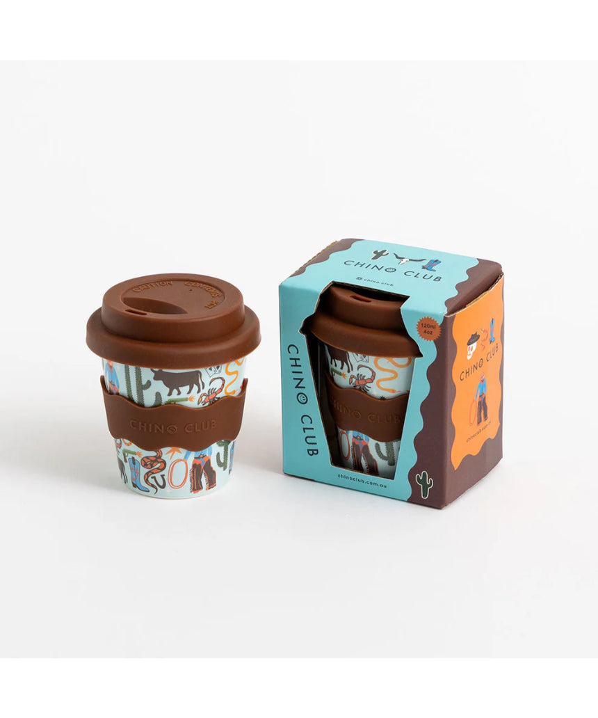 Chino Club Cowboy Baby Chino Cup 4oz for kids, featuring a cowboy design, shown inside its box.