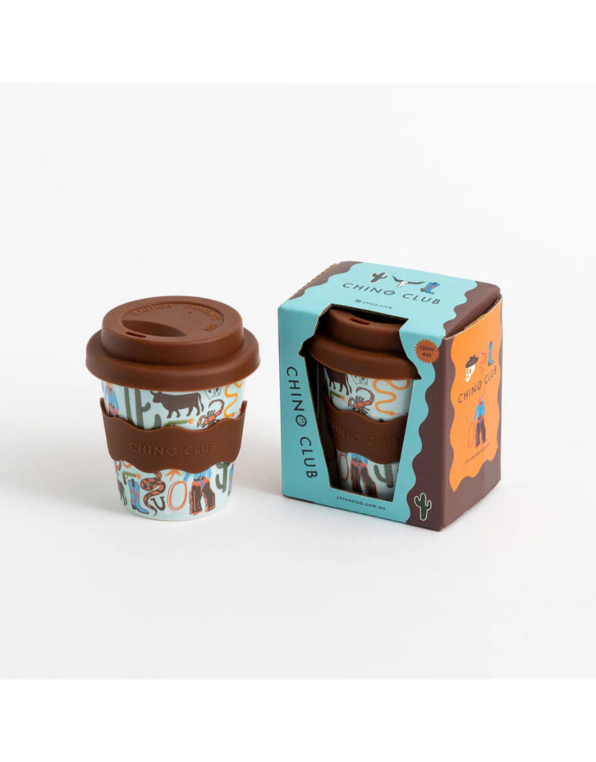 Chino Club Cowboy Baby Chino Cup 4oz for kids, featuring a cowboy design, shown inside its box.