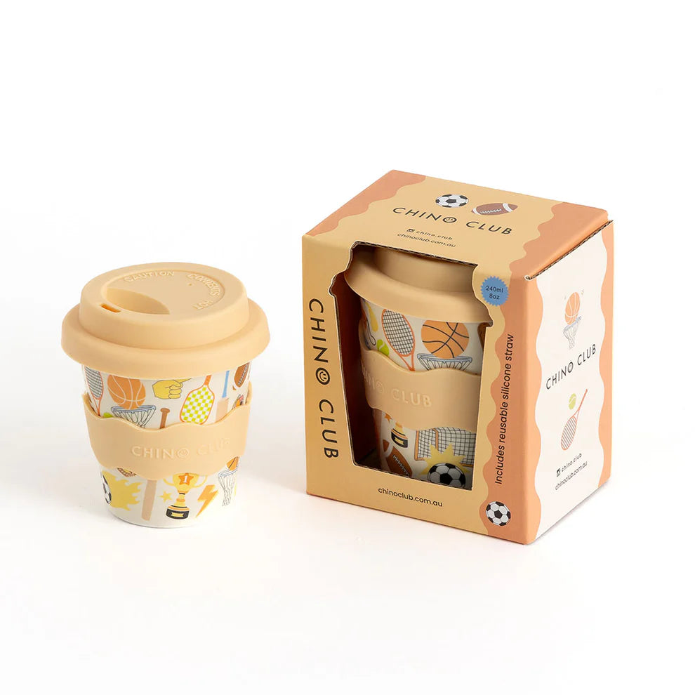 Chino Club Sports Baby Chino Cup 4oz for kids, white plastic cup with colorful sports-themed design and secure lid.