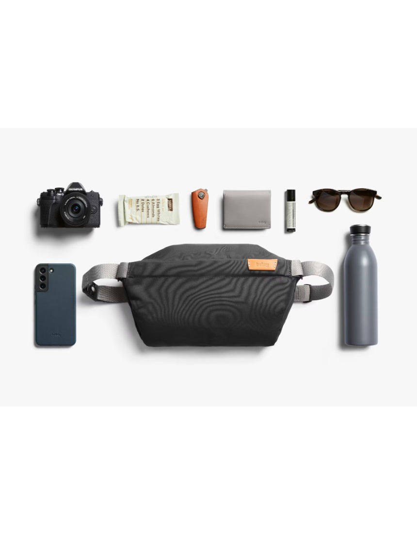 Bellroy Slate sling bag with adjustable strap and multiple compartments, designed for convenient everyday carrying.