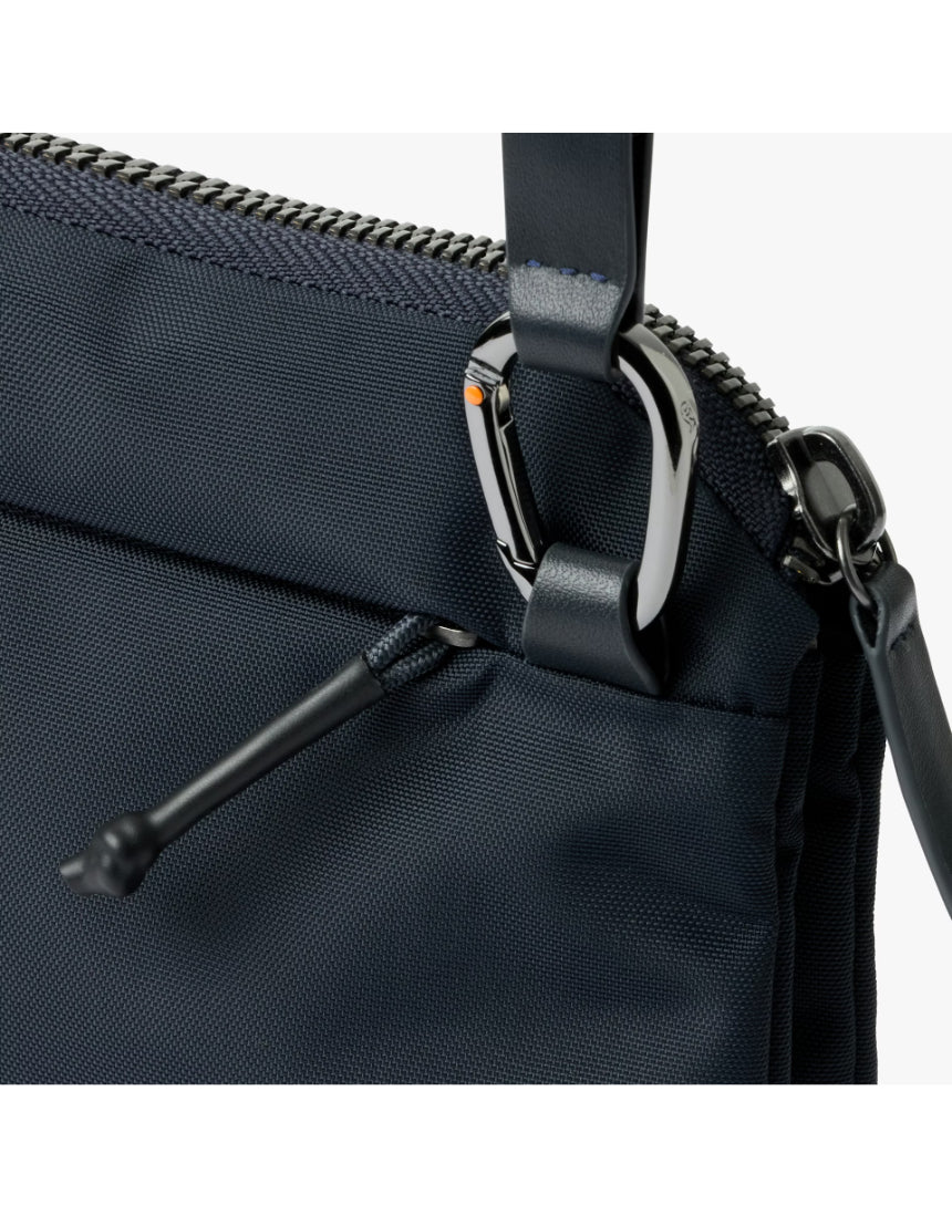 Bellroy Tokyo Side Bag in navy, a sleek crossbody bag with multiple compartments and adjustable strap for everyday use.