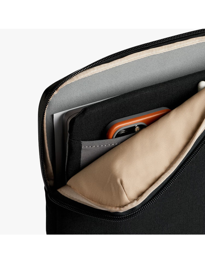 Black Bellroy Laptop Caddy for 14-inch laptops with organized compartments for accessories and documents.