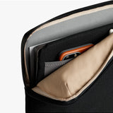 Black Bellroy Laptop Caddy for 14-inch laptops with organized compartments for accessories and documents.