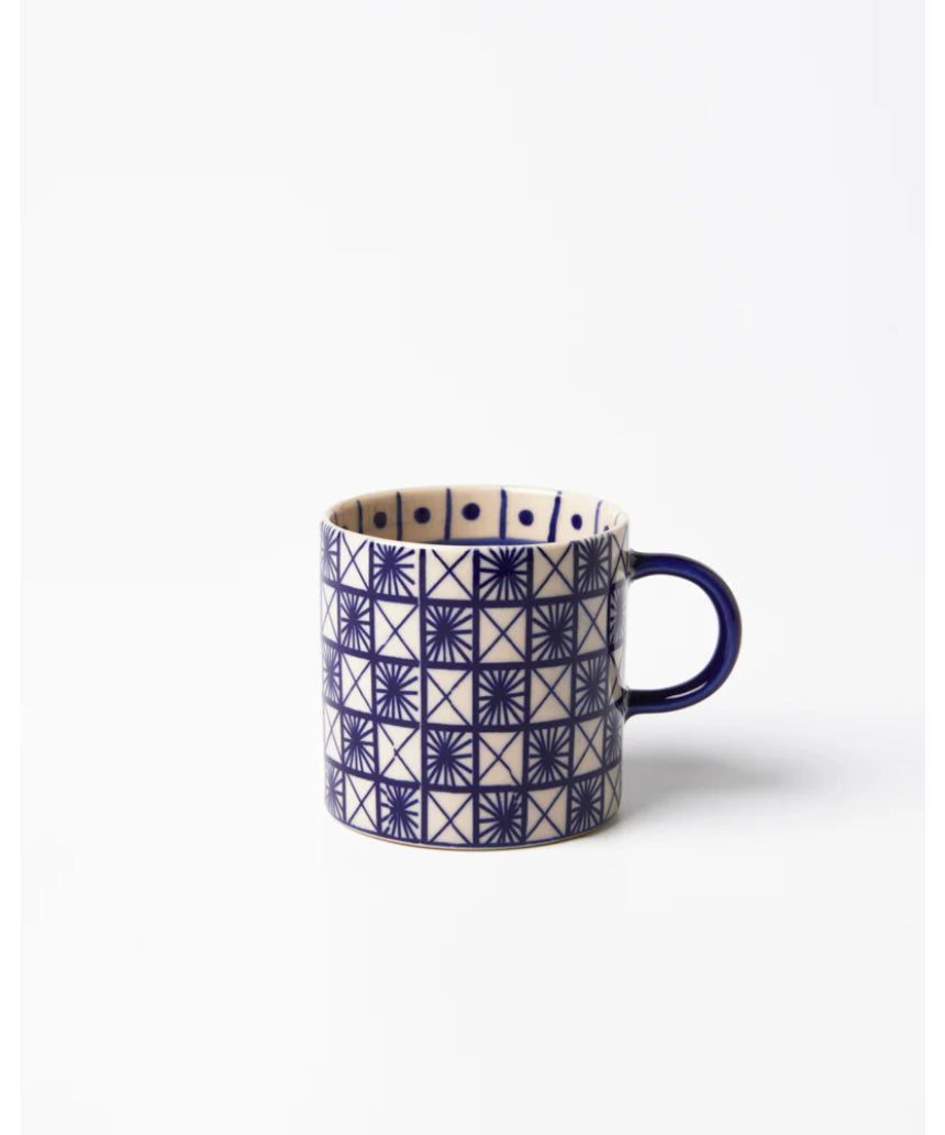 Jones & Co Caravan Espresso Indigo ceramic mug with detailed blue and white pattern, perfect for coffee or tea.