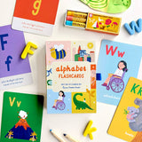 Colorful A-Z illustrated alphabet flashcards by Lauren Sissons Studio, featuring vibrant letter designs for early learning.