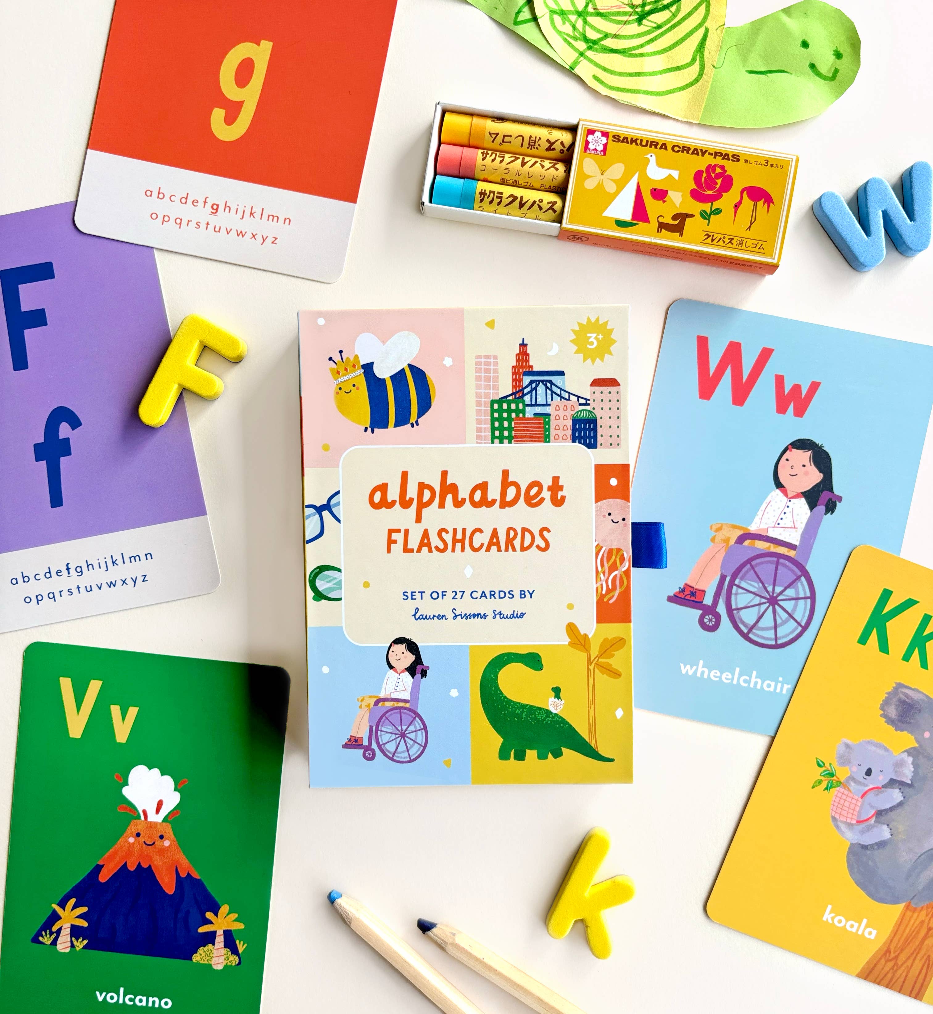 Colorful A-Z illustrated alphabet flashcards by Lauren Sissons Studio, featuring vibrant letter designs for early learning.
