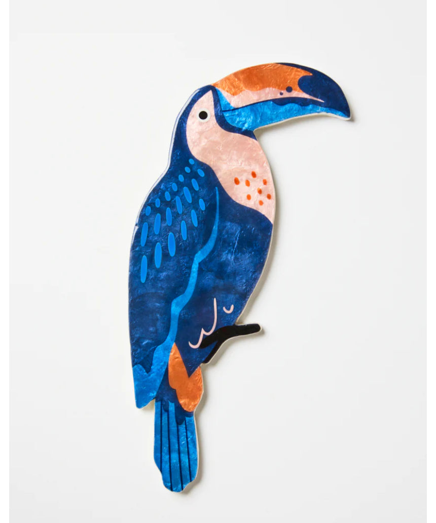 Jones & Co navy wall art featuring a colorful toucan perched on a branch, ideal for tropical or nature-inspired decor.
