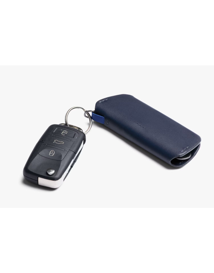 Bellroy Key Cover Plus 3rd Edition in navy, a sleek leather key organizer with multiple key slots and compact design.