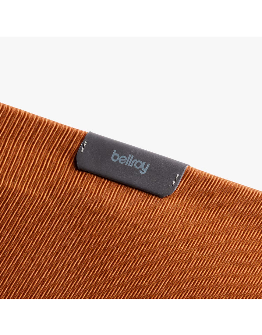 Bellroy 16-inch laptop sleeve in bronze, featuring a sleek protective case with smooth fabric exterior and subtle branding.