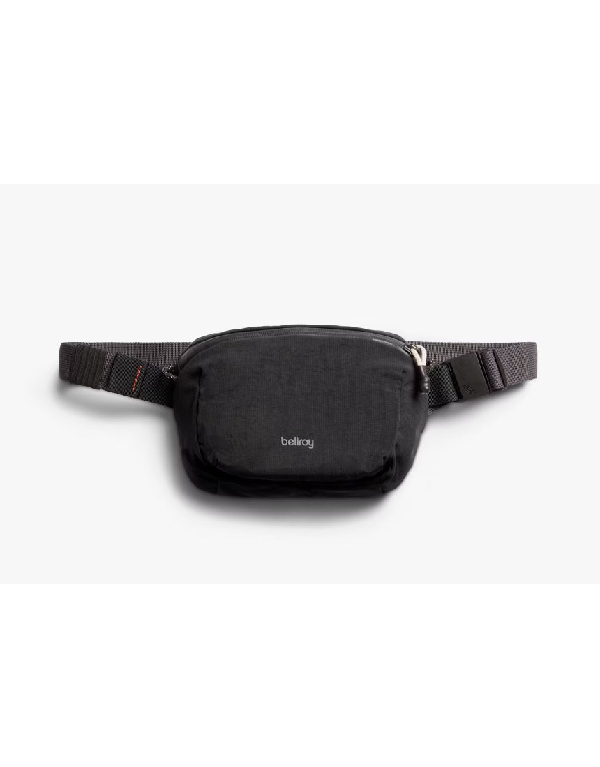 Bellroy Lite Belt Bag in black with adjustable strap and zippered main compartment, designed for convenient everyday carry.
