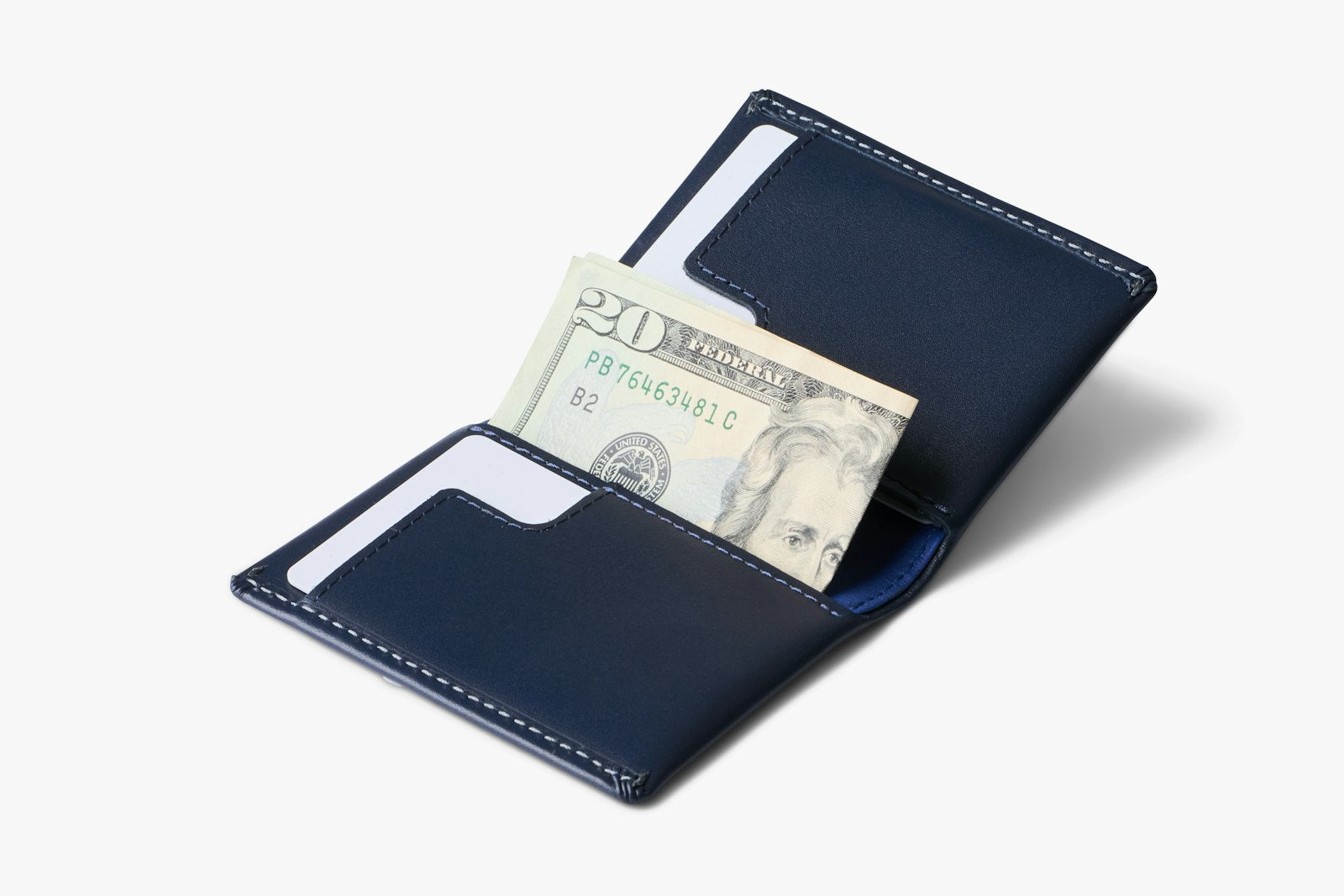Bellroy Slim Sleeve wallet in navy fabric showing multiple card slots and sleek design.