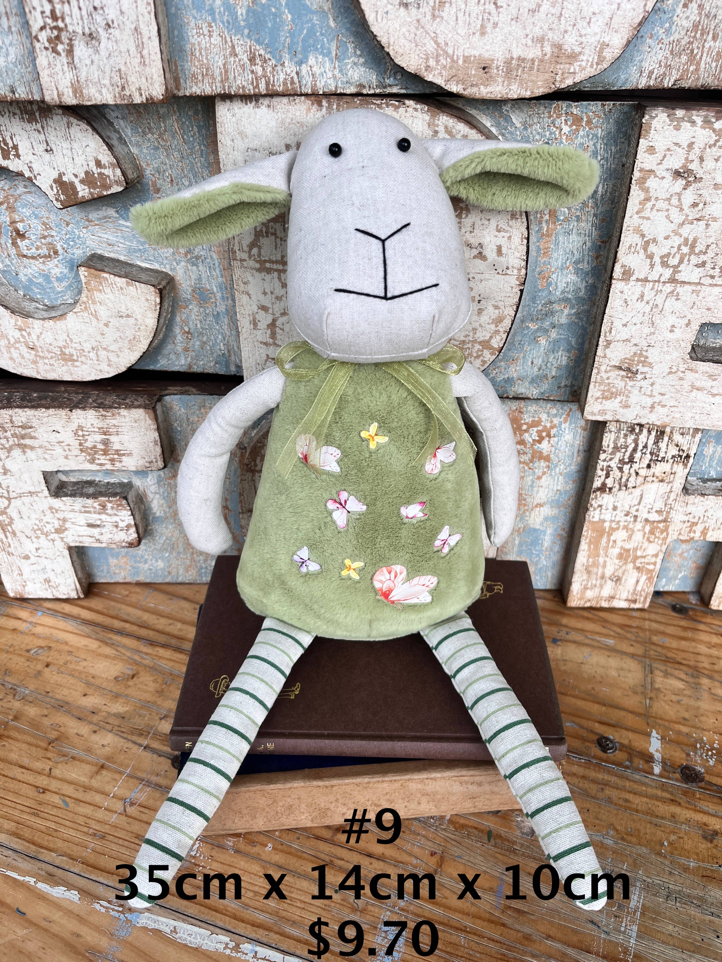 Amaranta Designs Daisy Lamb sculpture featuring a detailed white ceramic lamb with floral accents and intricate craftsmanship.