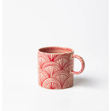Jones & Co Caravan Espresso Ruby jewelry piece with intricate design and vibrant ruby accents on a neutral background.